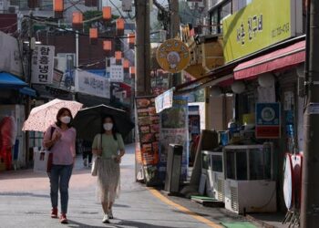 The secret to South Korea’s COVID success? Combining high technology with the human touch