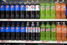 Soda bottles on retail shelves