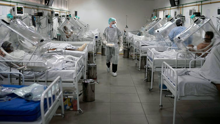 A hospital ward with patients on oxygen