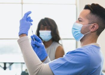 Should you get a COVID-19 booster shot now or wait until fall? Two immunologists help weigh the options