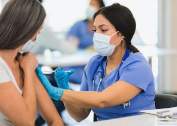 When should you get the new COVID-19 booster and the flu shot? Now is the right time for both