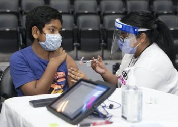 Adding COVID-19 to ‘designated diseases’ could boost vaccine uptake among children