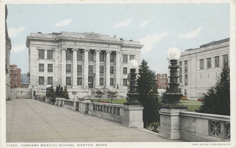 Postcard of large, neoclassical, stone building.