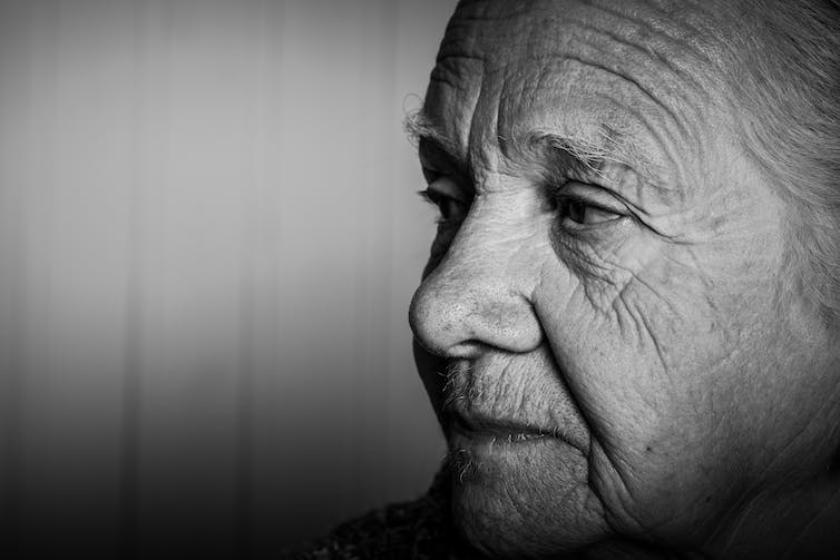 Close-up of an older woman looking to the side