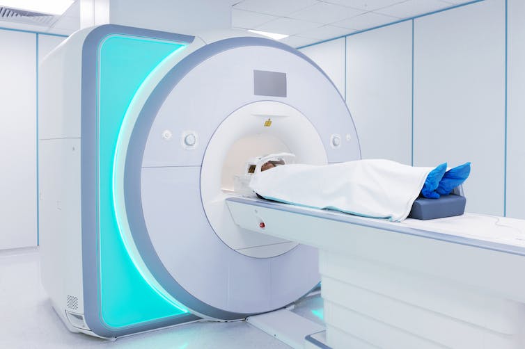 Person entering an MRI scanner