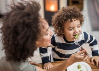 Helping children eat healthier foods may begin with getting parents to do the same, research suggests