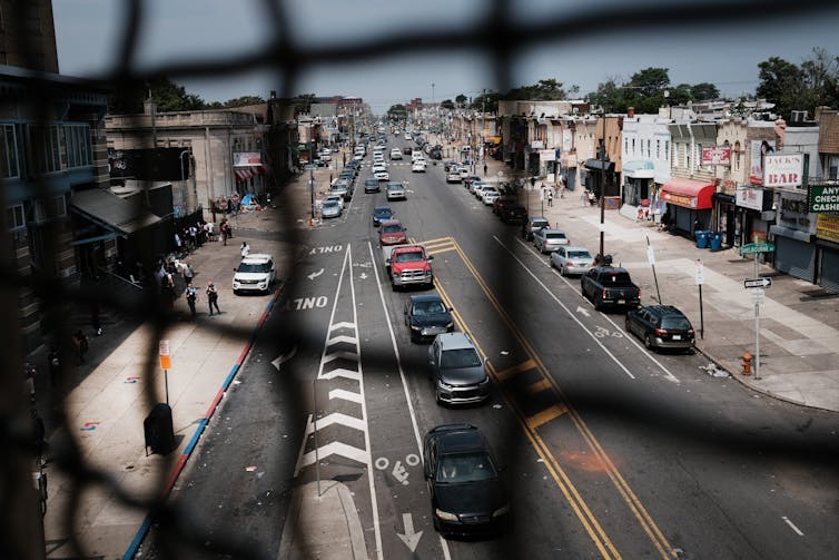 A view from above looking down a bustling urban corridor in Kensington, a high-poverty neighborhood of Philadelphia