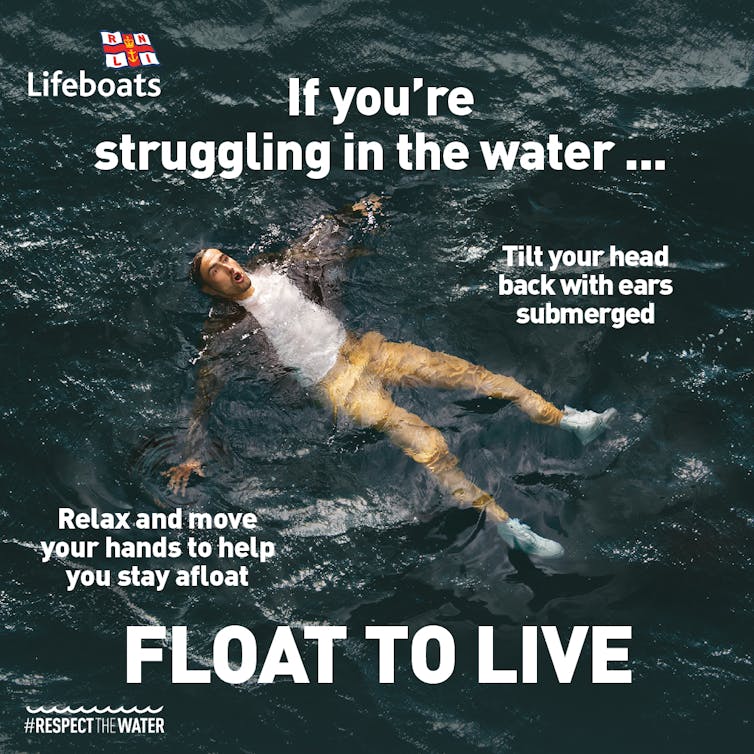 poster with white writing, Float to Live, and clothed man on back lying on surface of sea