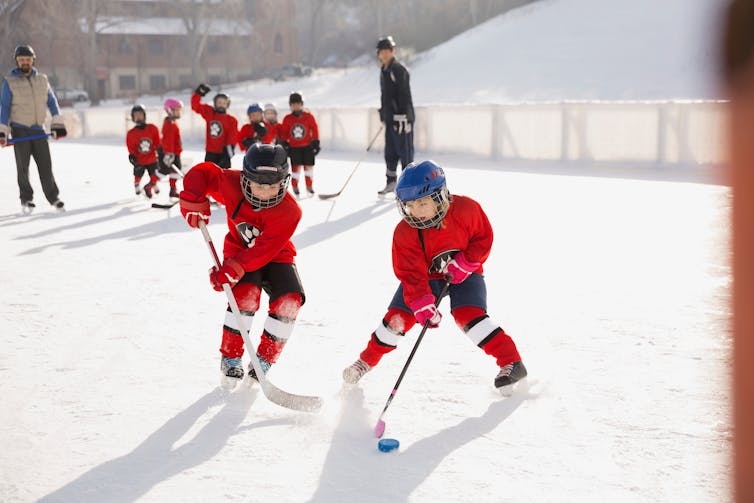 Two young hockey players on the ice