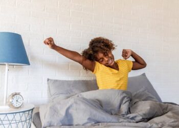 Why do I feel better when I wake myself up instead of relying on an alarm? A neurologist explains the science of a restful night’s sleep