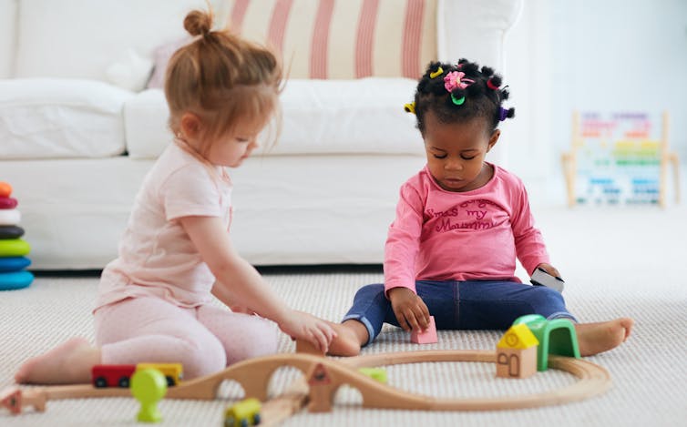 Two toddlers playing