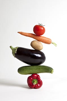 Assorted vegetables stacked on top of each other