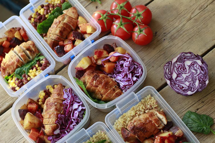 Plastic containers filled with pre-portioned meals.