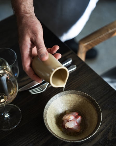 Sauce is poured on to a starter