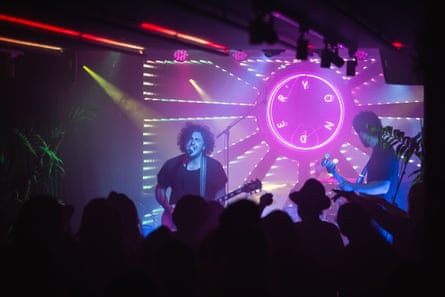 Person singing on stage at Yonder live music venue in Queenstown