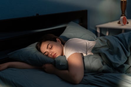Woman sleeping in bed