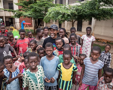 Olusola Stevens with some of the children at Vine Heritage Home in Gwagwalada, July 2025.