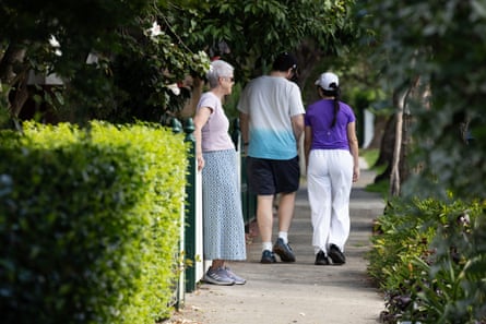 Pedestrians make their way along the narrow footpath on Weston Street in Dulwich Hill.