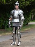 Jonathan Acott in a silver suit of armour