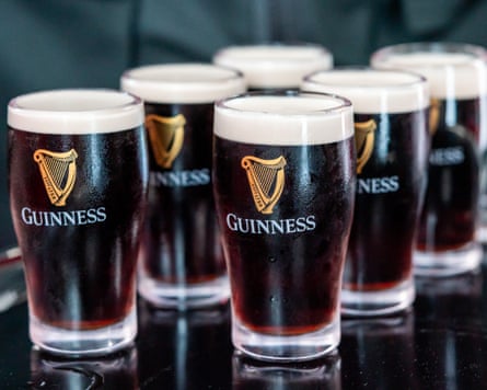 glasses of guinness beer samples on bar top