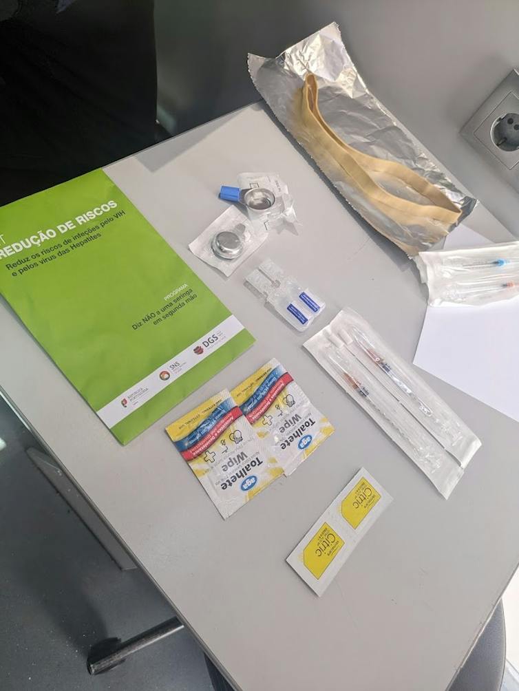 a small table with a clean injection kit laid out