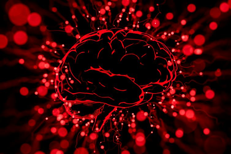 Abstract 3D red glowing brain with neural connections and energy particles on a dark background.